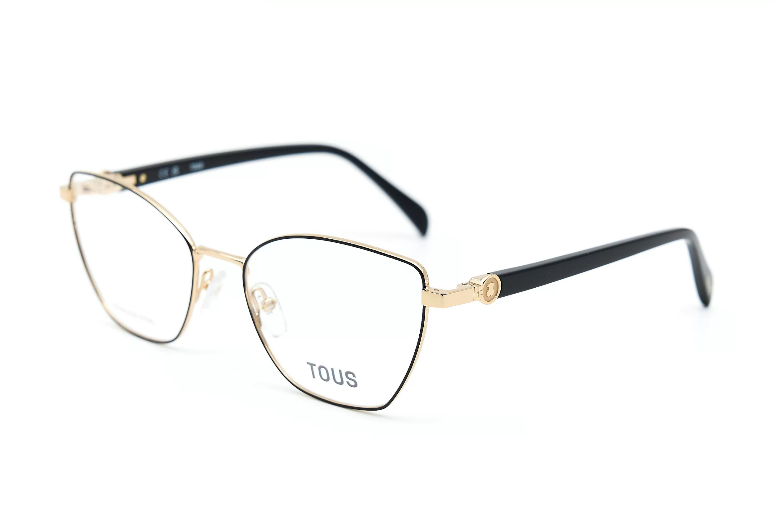 Женская оправа TOUS VTO462 COL0301 из окрашенного металла с черными дужками и фирменным логотиипом-мишкой