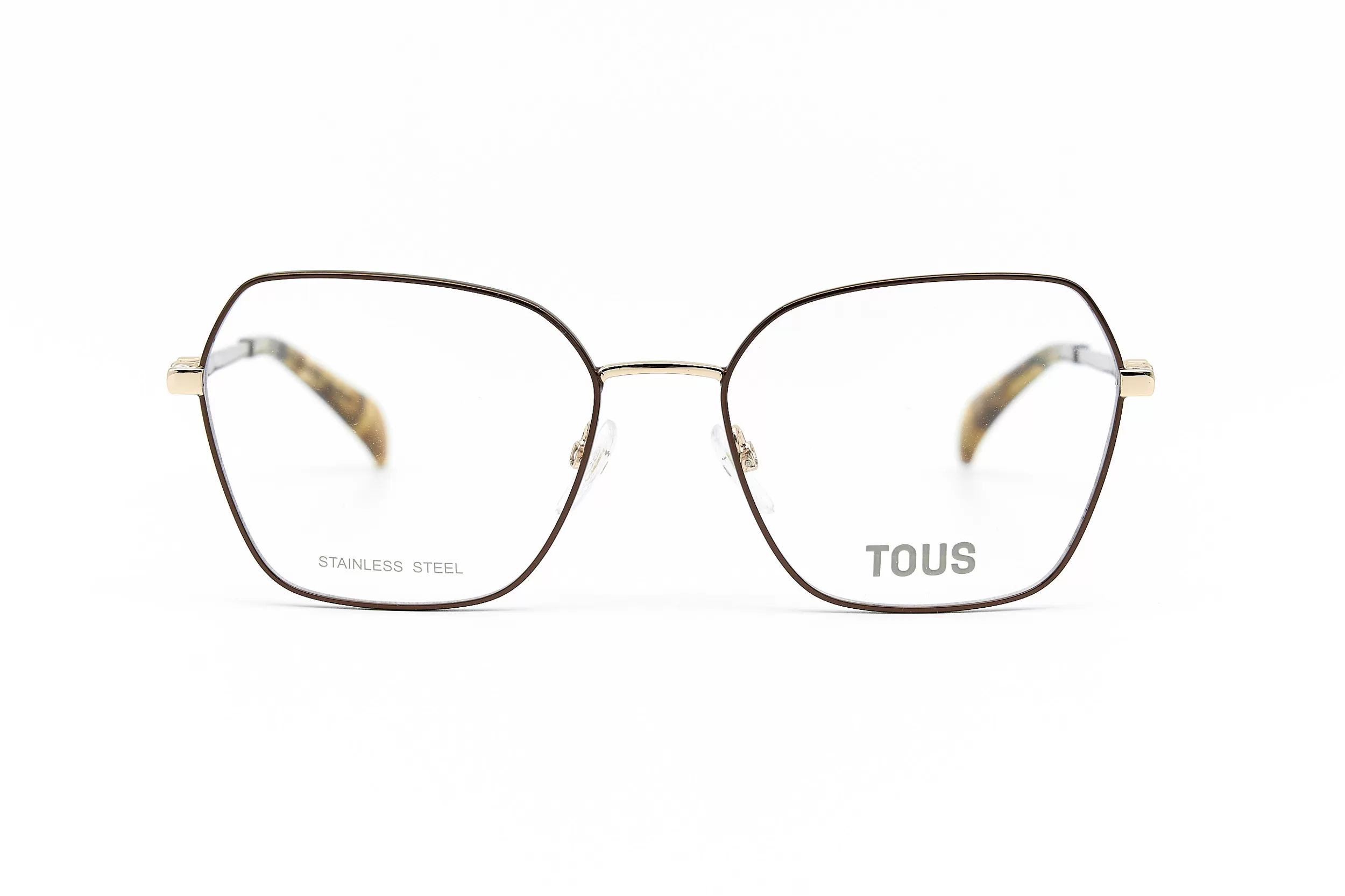 Женская оправа TOUS VTO463 COL0367 из окрашенного металла с коричневымм дужками и фирменным логотипом-мишкой