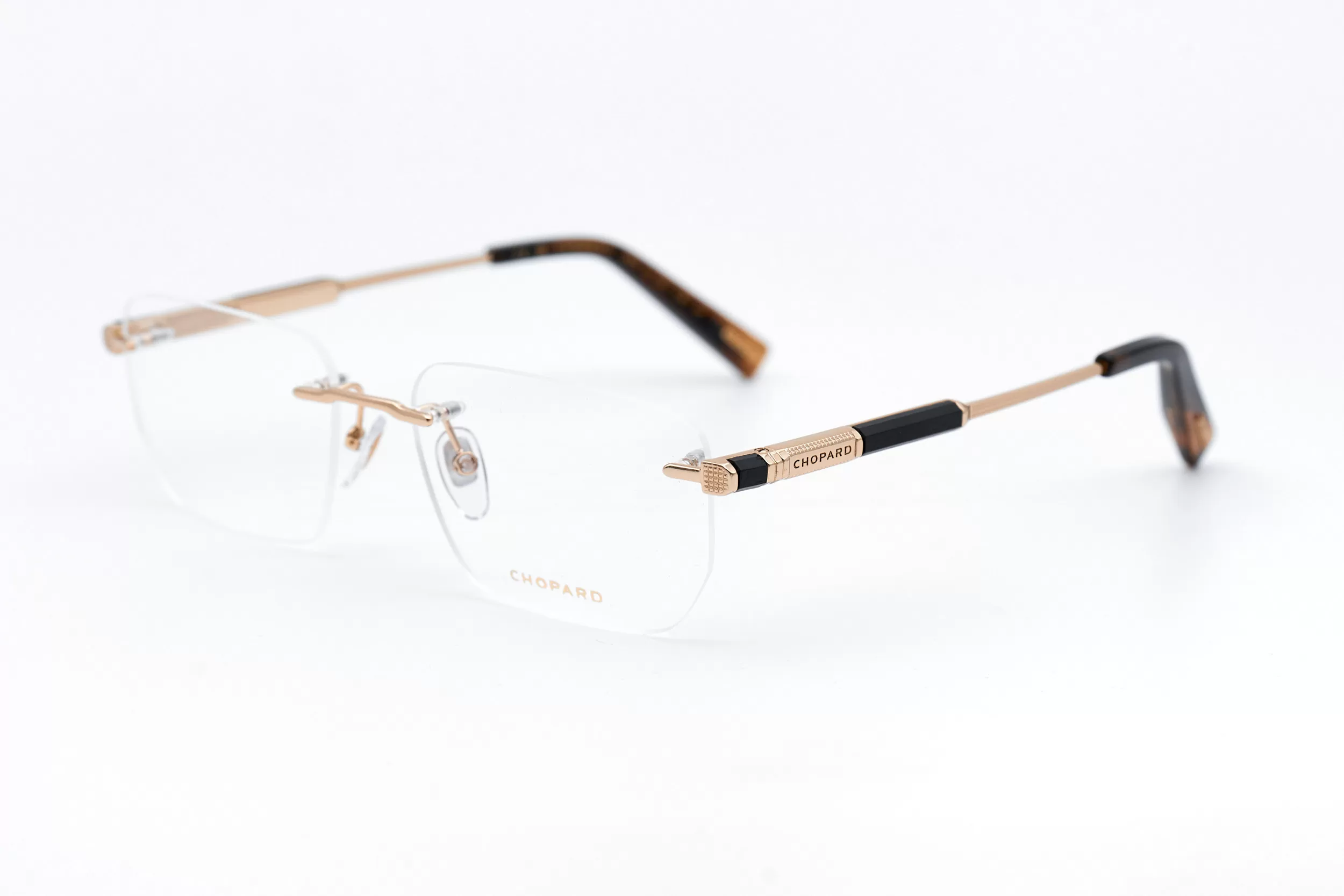 Мужская оправа Chopard безободковая оправа золотого цвета, с ювелирными элементами и вставками из ценных пород дерева