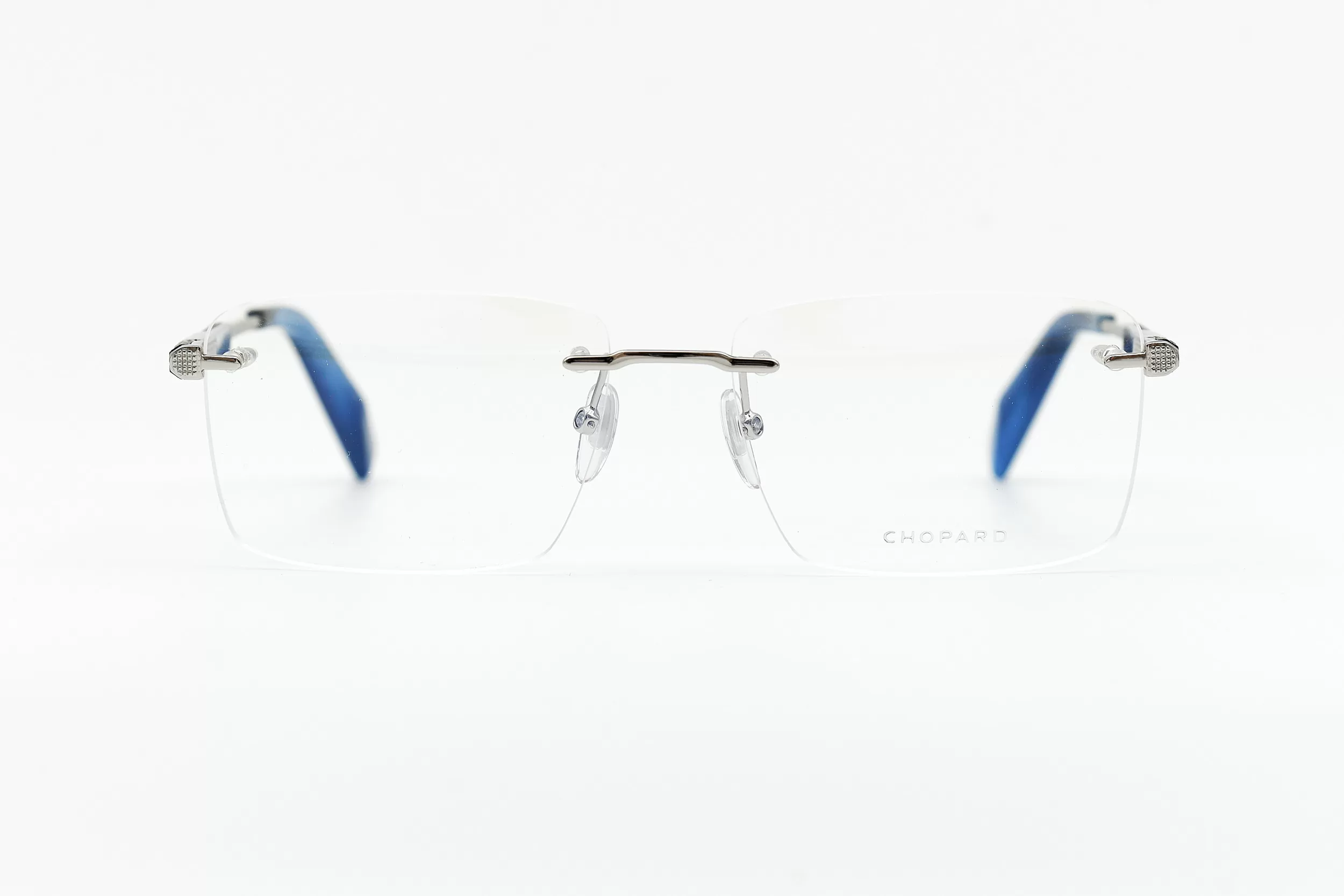 Мужская оправа Chopard безободковая оправа серебристого цвета, с ювелирными элементами, голубыми заушниками и вставками из ценных пород дерева