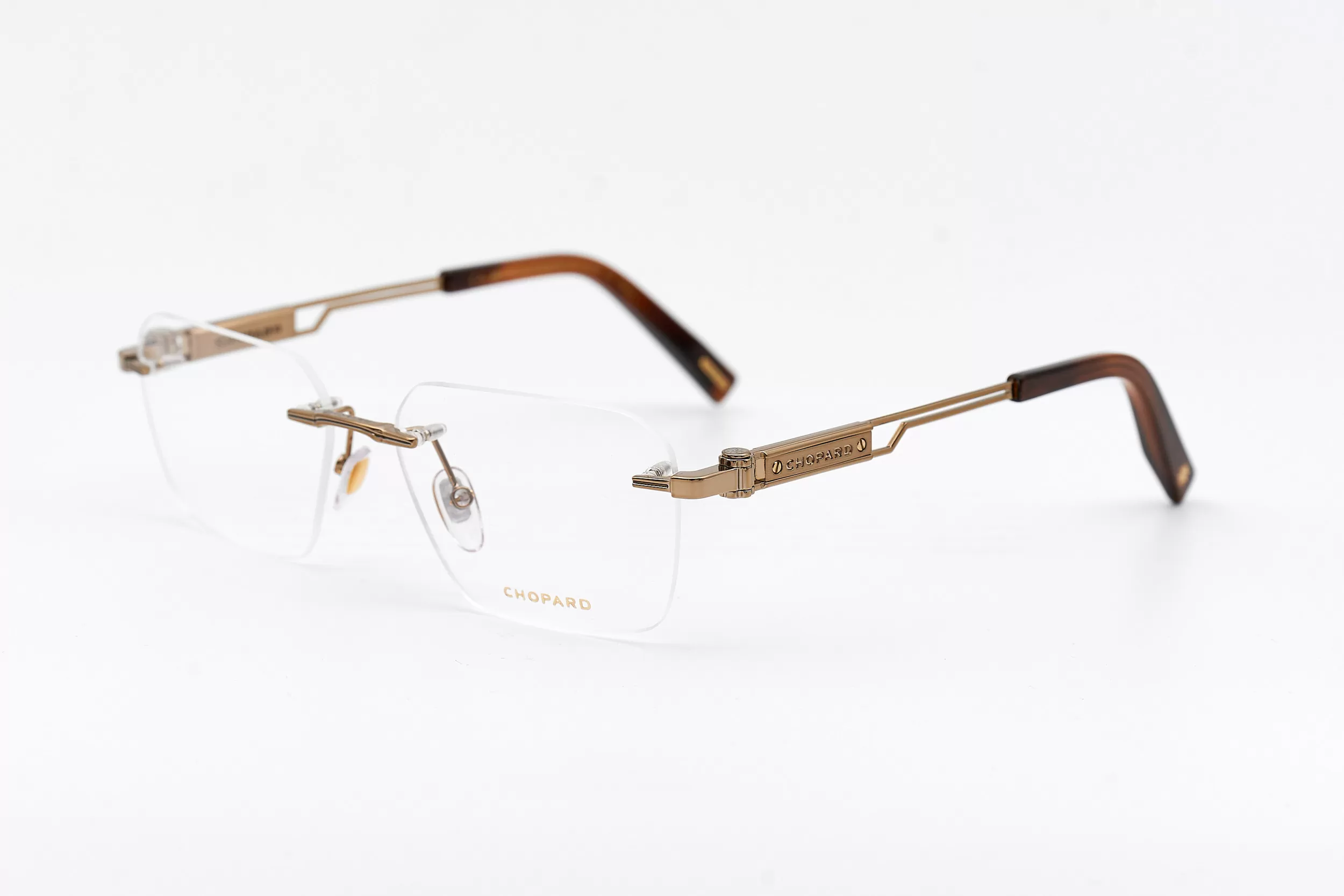 Мужская оправа Chopard безободковая оправа золотого цвета, с ювелирными элементами