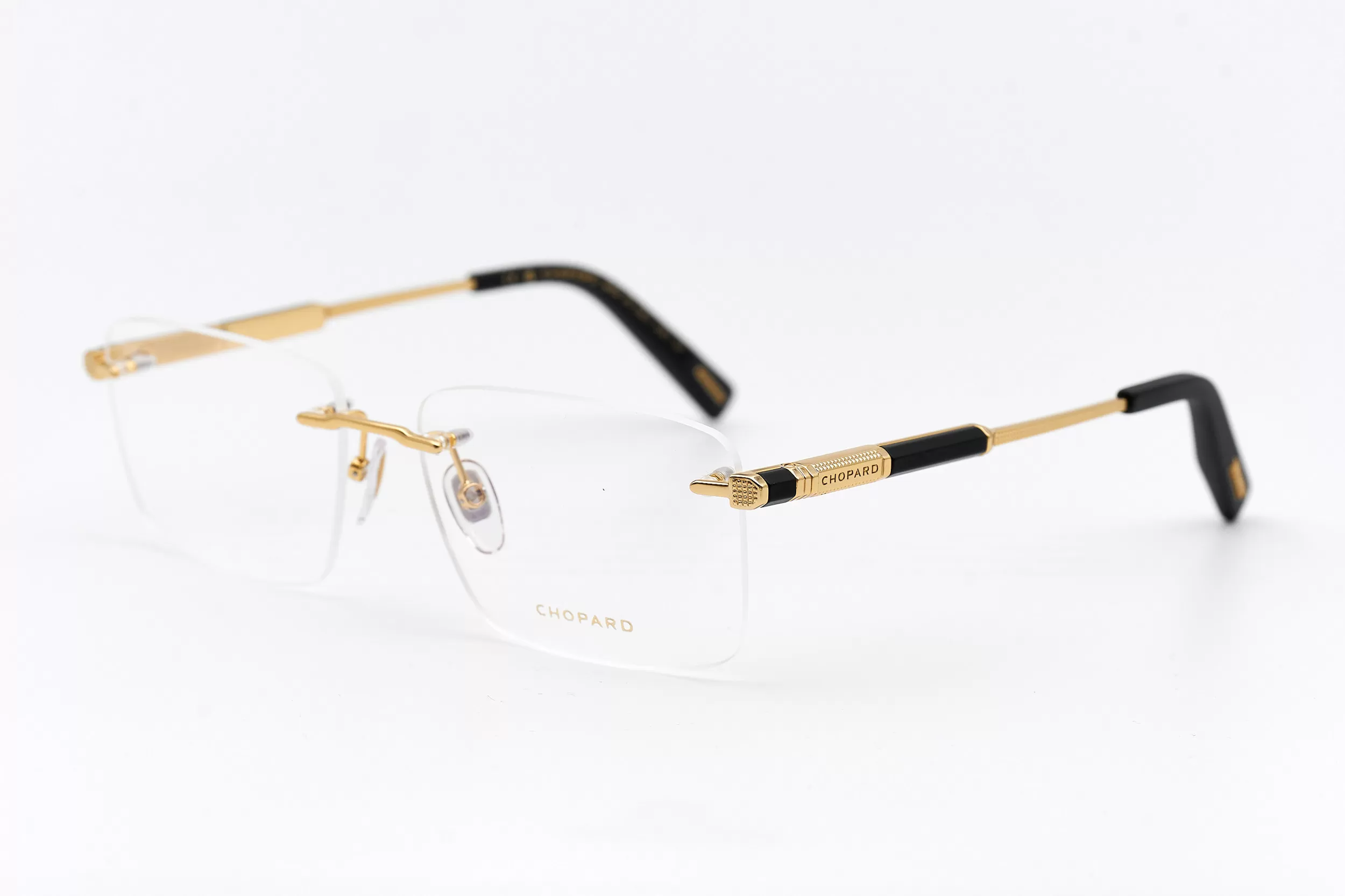 Мужская оправа Chopard безободковая оправа золотого цвета, с ювелирными элементами и вставками из ценных пород дерева