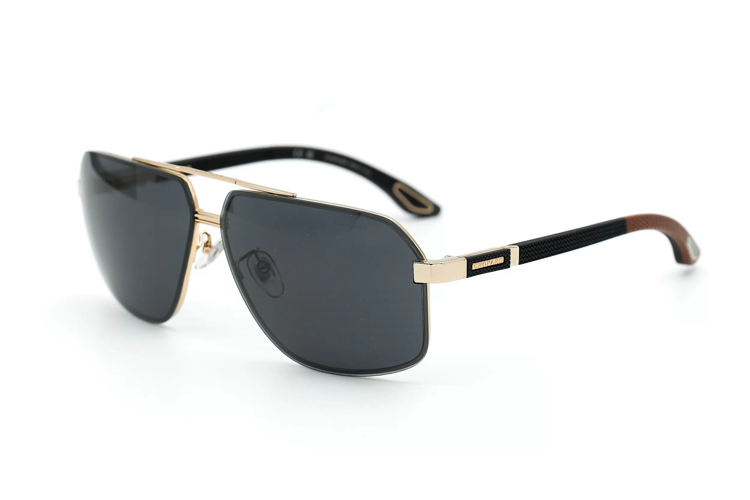 Солнцезащитные очки Chopard с золотой рамкой элементами из каучука и серыми стеклами